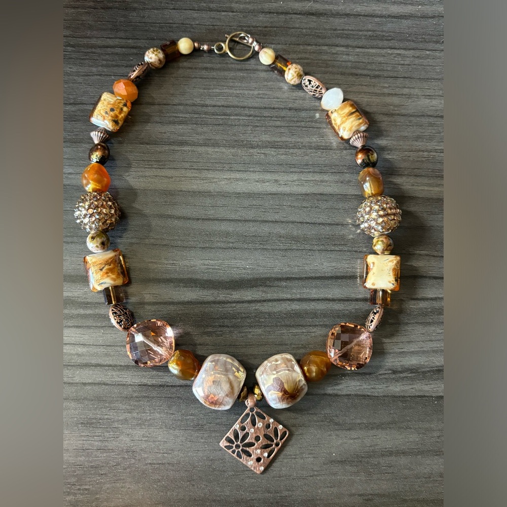 Jesse James beaded necklace with pendent. 19 inches total length. Toggle clasp.